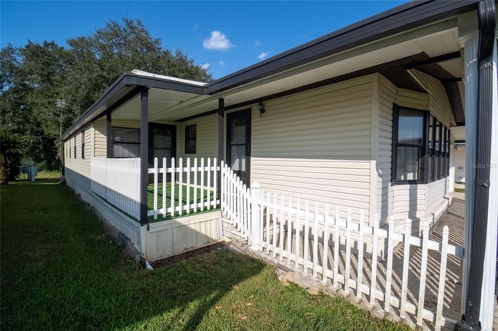 SIDE PORCH LEADING TO GUEST ENTRANCE