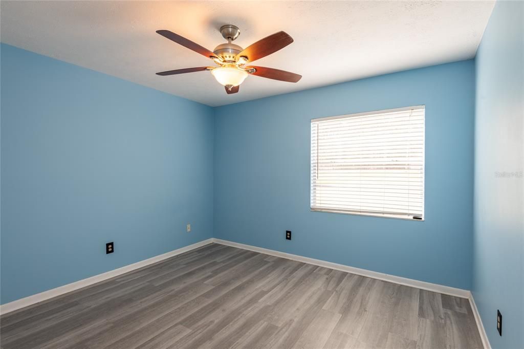 Bedroom with built-in closet.