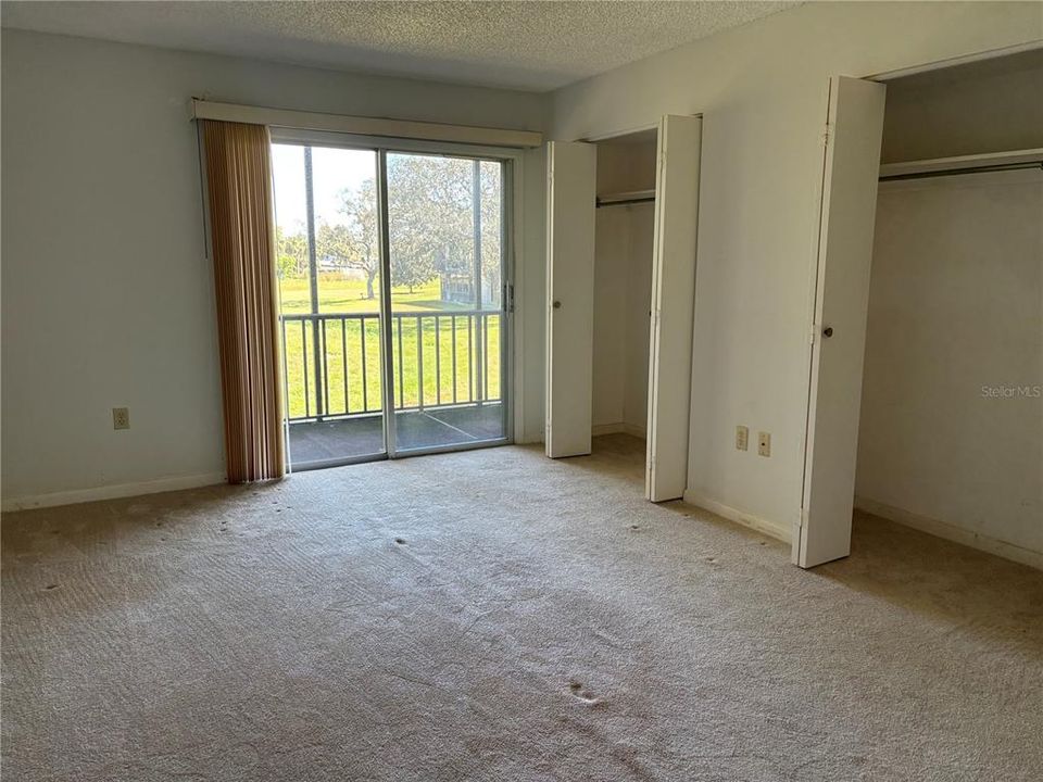 Primary Bedroom with Balcony Access