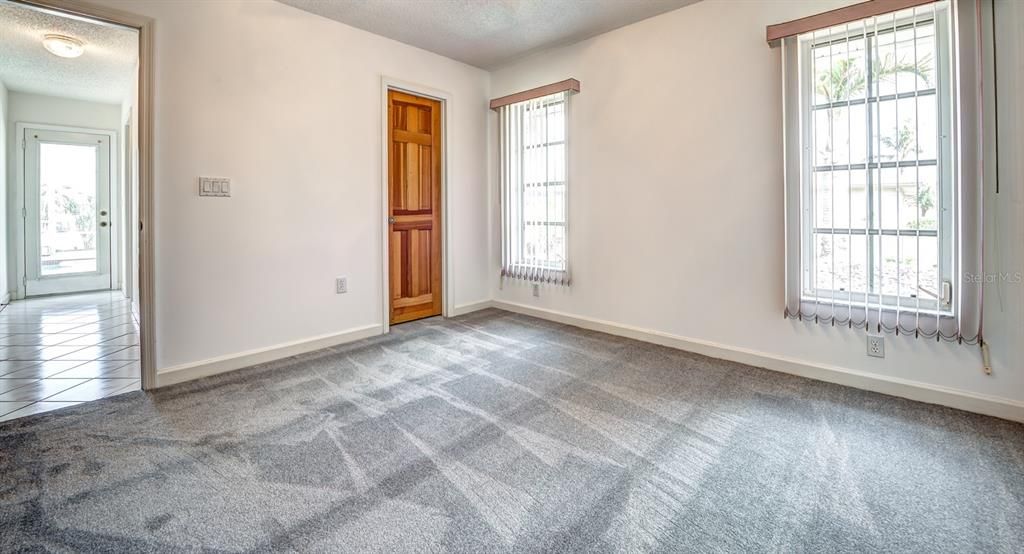 Bedroom 4 has a large walk-in closet and is privately located in the rear of the home. There is a double wall closet just outside the door in the hallway making this a great space if needed for a multi-generational family.