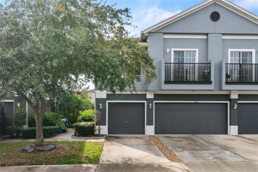 attached 1 car garage and additional parking in the driveway