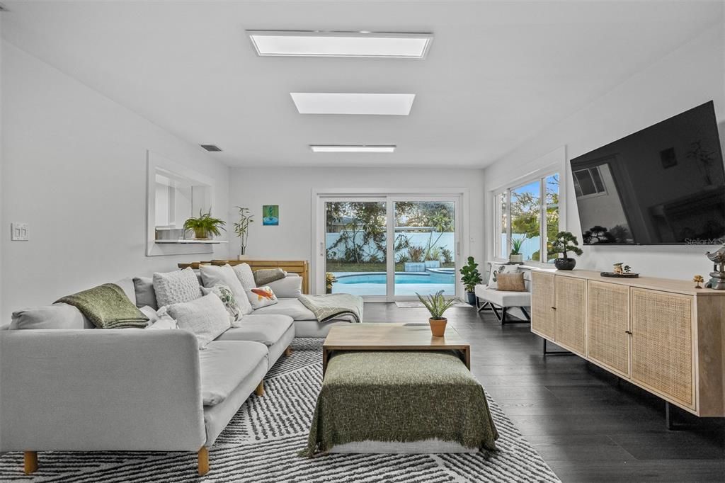 Zen inspired main living area with skylights, new impact slider to pool and tranquility