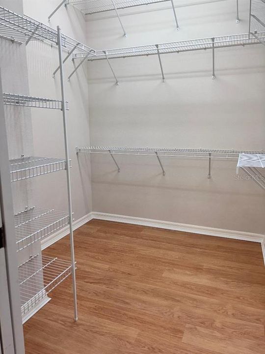 PRIMARY BEDROOM WALK-IN CLOSET