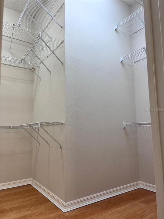 PRIMARY BEDROOM WALK-IN CLOSET