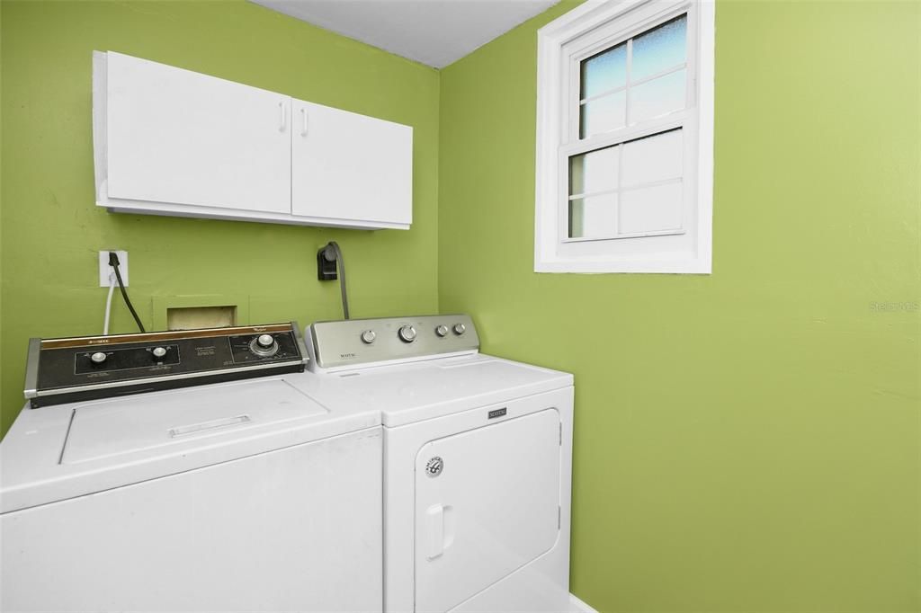 Laundry off Master with Side Entry door