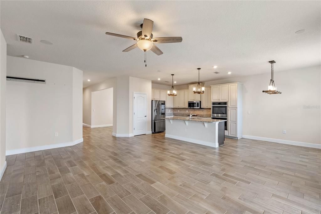 Gorgeous wood plank ceramic tile flooring.