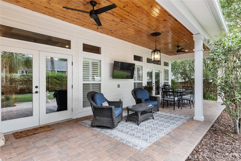 ROAMANTIC LANAI WITH BRICK PAVERS AND TONGUE AND GROOVE PINE CEILING