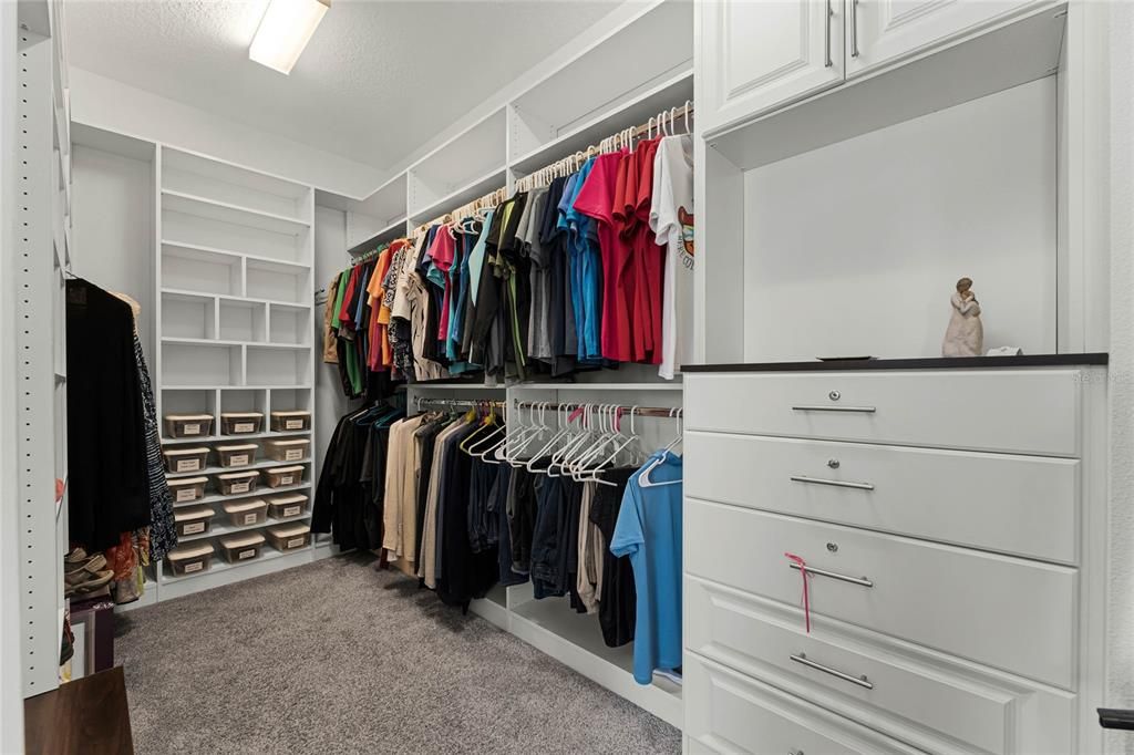 Walk-in Closet with custom shelving