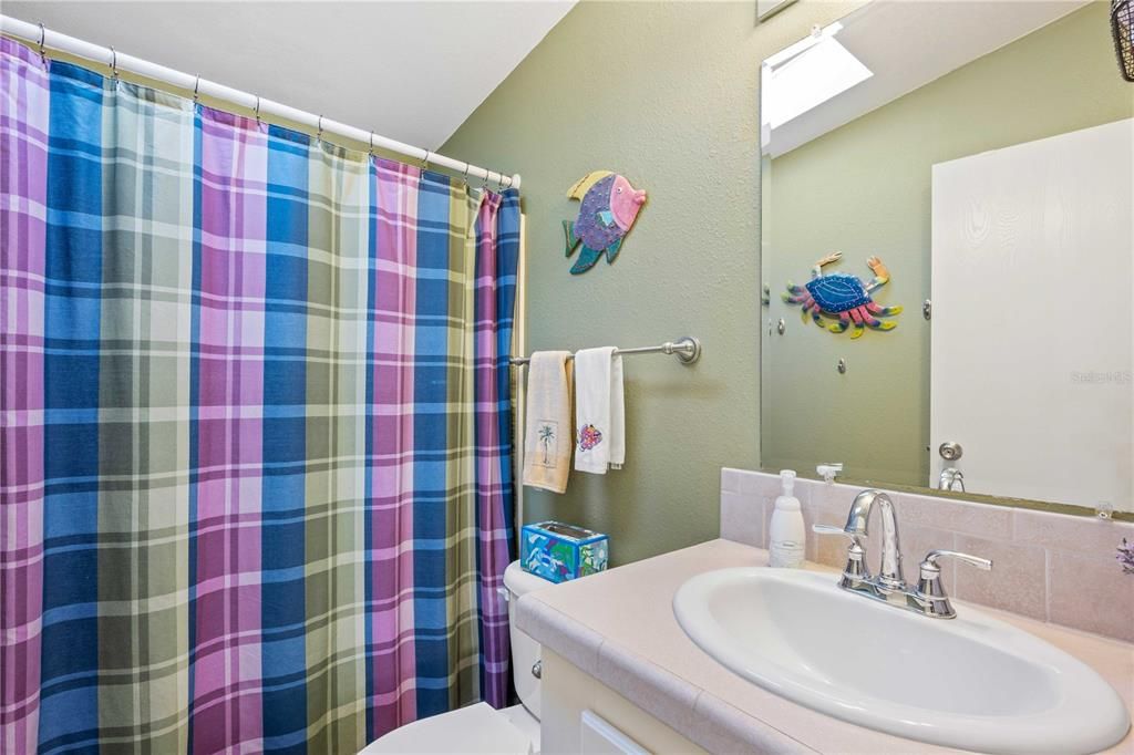 Guest bathroom. tub shower