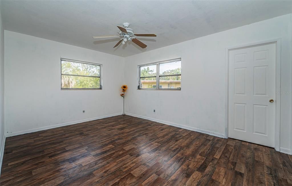 Bedroom 3 with access to the enclosed porch