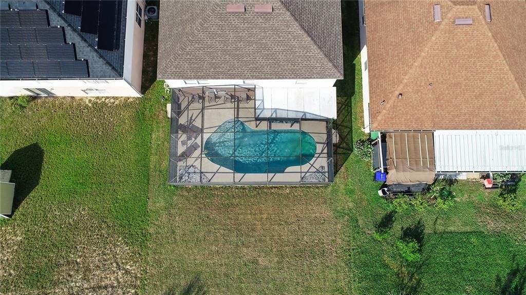 View of backyard and pool