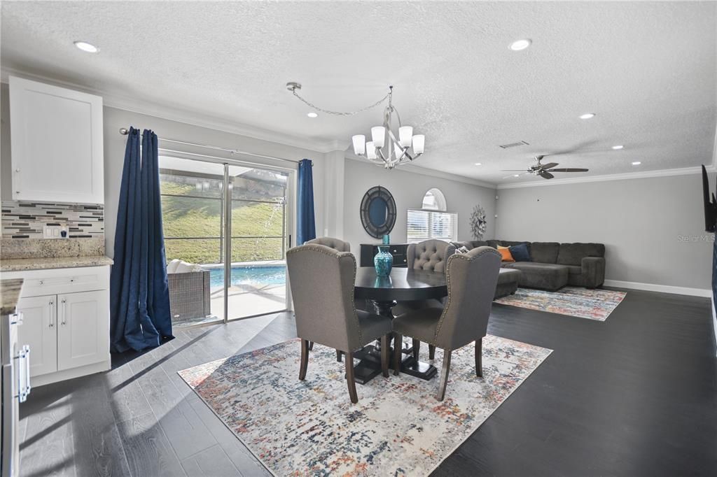 Dinette and Sliding Glass doors that lead to pool & patio