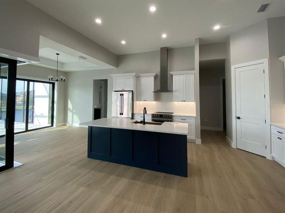 Open space with dining area to the left of kitchen