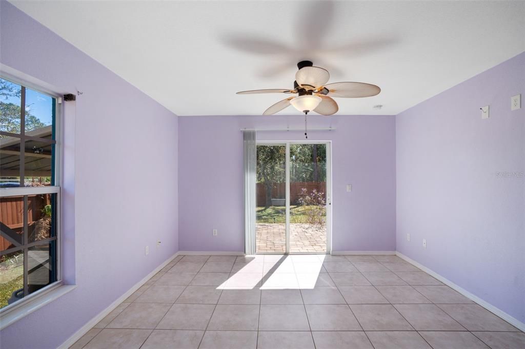 Primary bedroom with slider to patio