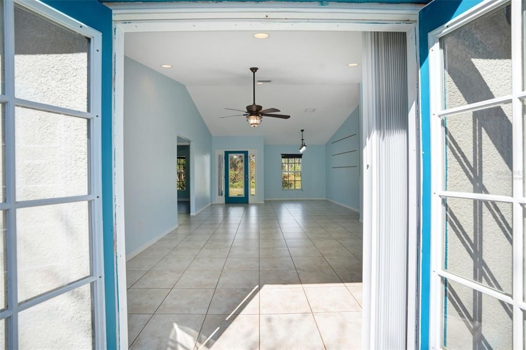 Virtually staged - living room, foyer, dining room