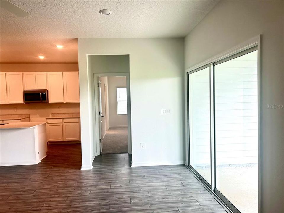 Family Room Toward Primary Bedroom and Covered Lanai