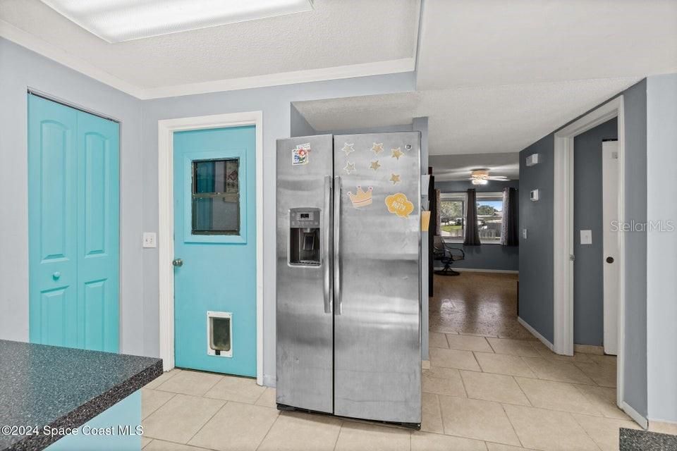 Door to the pantry and garage.