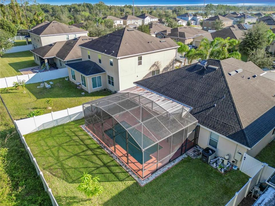 Aerial View of Home Exterior Back