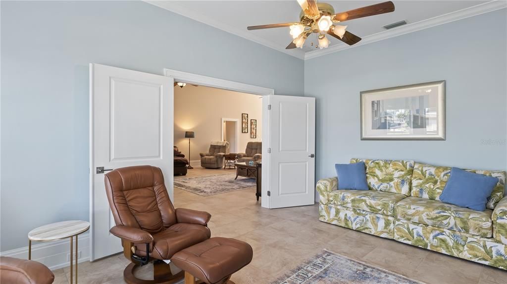 Another view of the tv room off the main living area - this could easily become a large private suite by adding a closet!