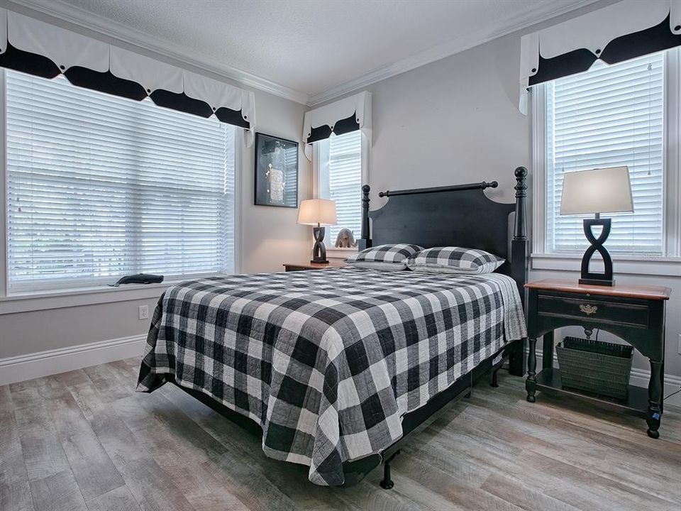 FRONT GUEST ROOM WITH CUSTOM VALANCES.