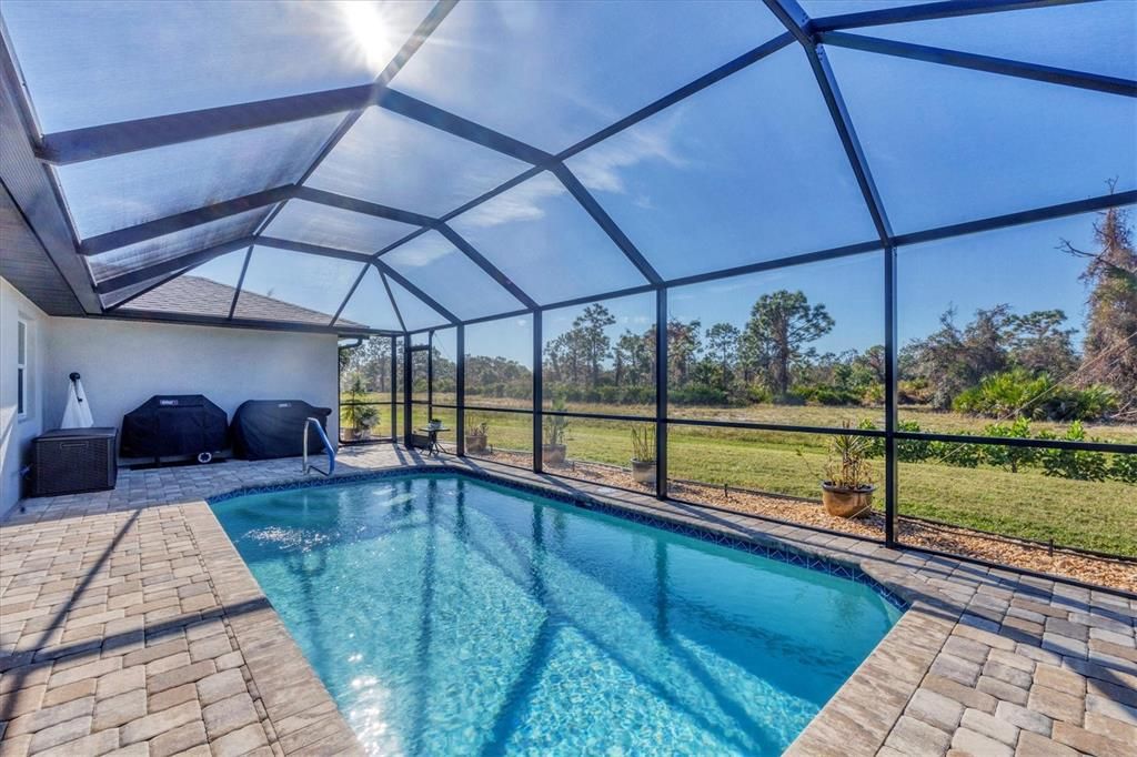 Stone accents around the home and pool