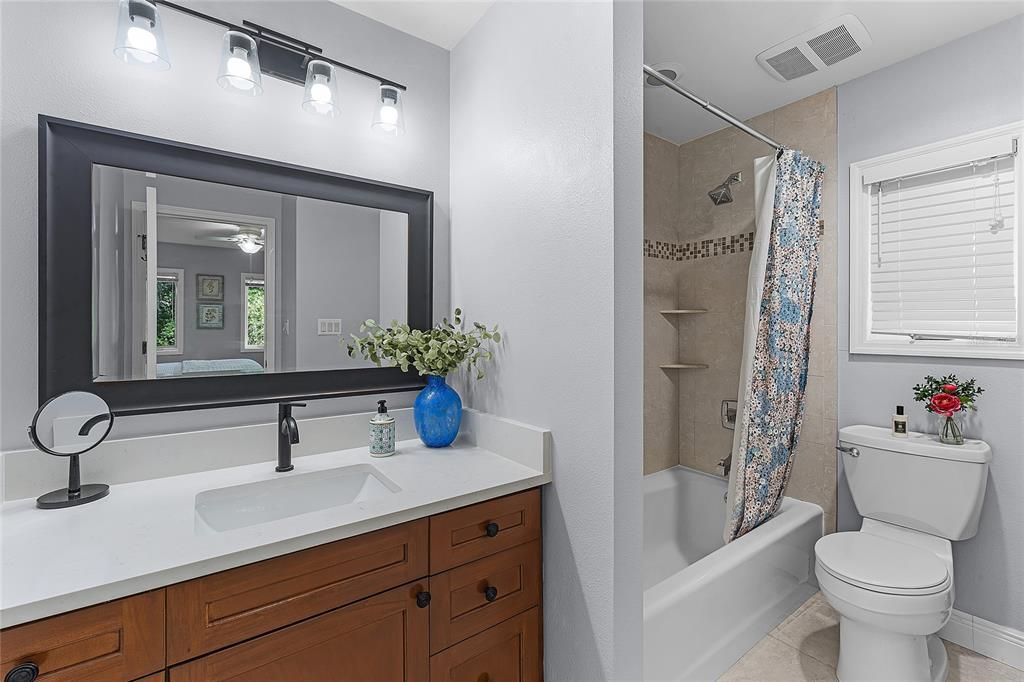 View of the second bedroom en-suite bathroom.