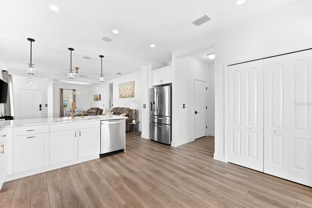 Kitchen with pantry closet on right