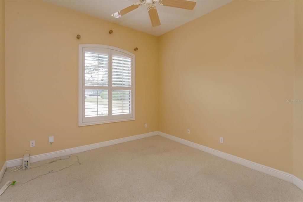 Bedroom 4 with carpet and plantations shutters (no closet)