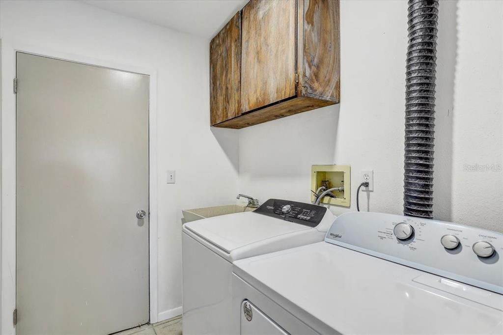 Inside laundry room (washer and dryer included)