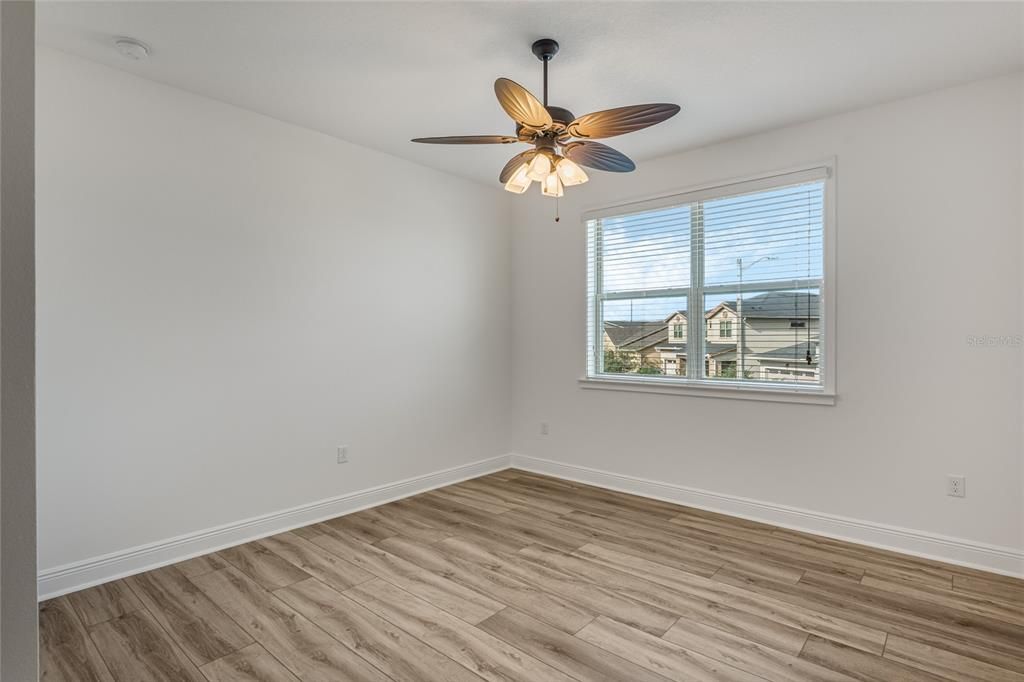 Bedroom 2 also has LVP flooring