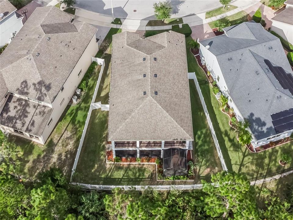 Vinyl fenced yard.  Extended screen enclosure off of the main patio & balcony.