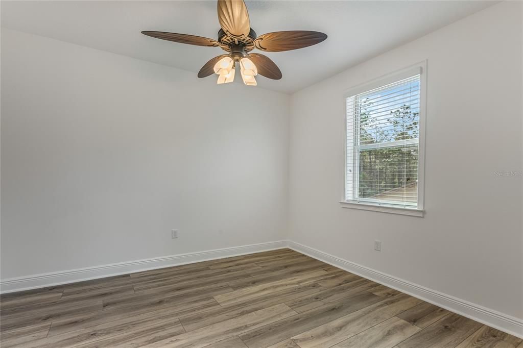 Bedroom 4 has LVP flooring