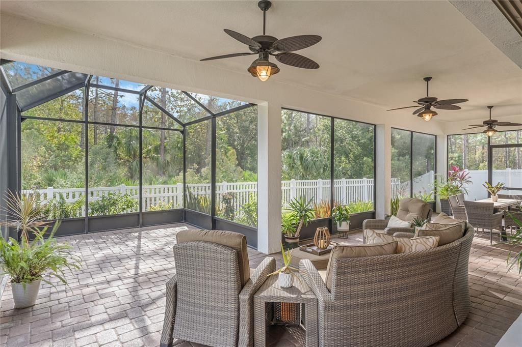 Downstairs patio with the extended screen enclosure and amazing tranquil views!