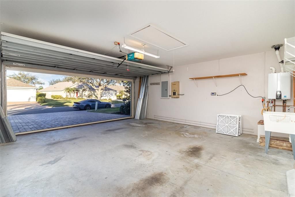 Automated Retractable Screen For Garage Door