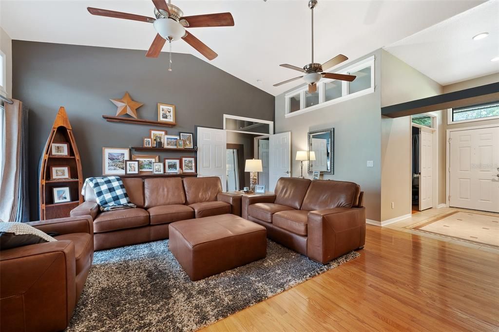 large double entry foyer leading to beautiful open concept great room with views to lanai and pool.