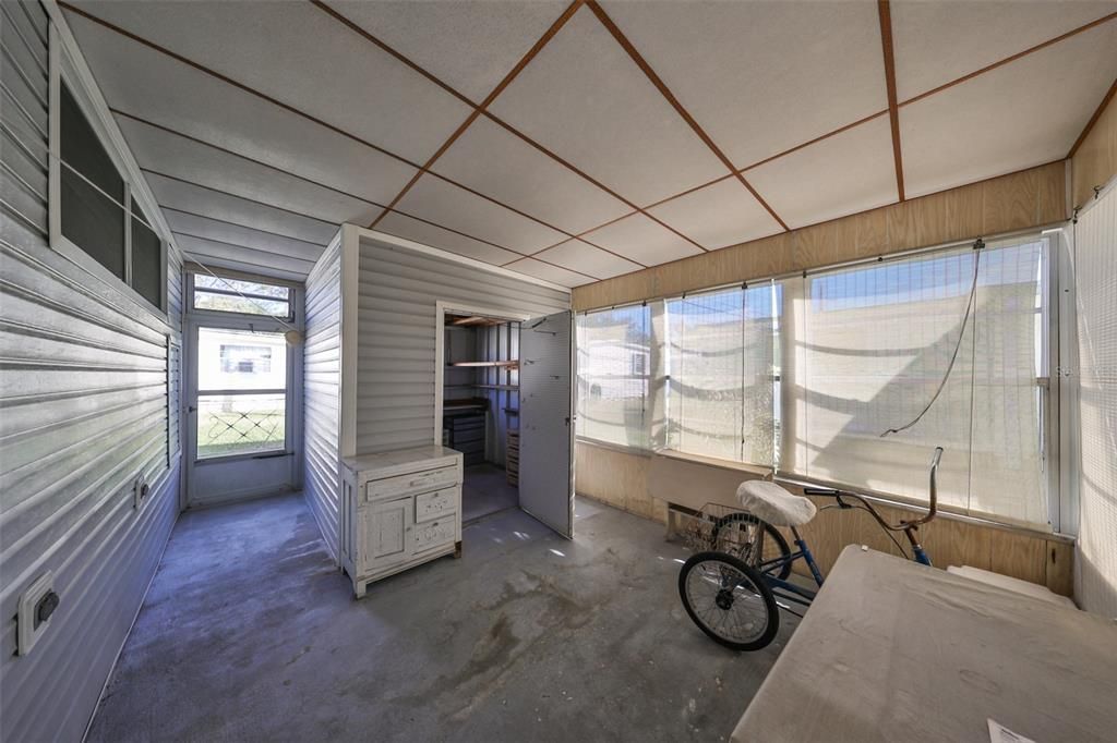 Patio room with an enclosed Utility Room housing the Washer and Dryer.  20x12