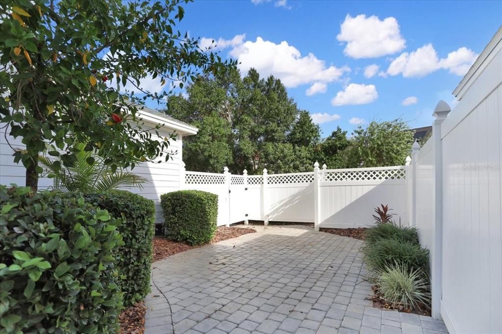 Backyard fenced and pavers