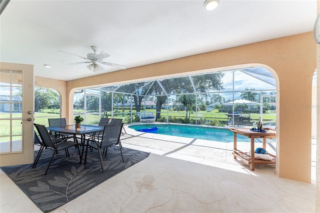 Beautiful Outdoor Area with Dining Table and Sun Loungers