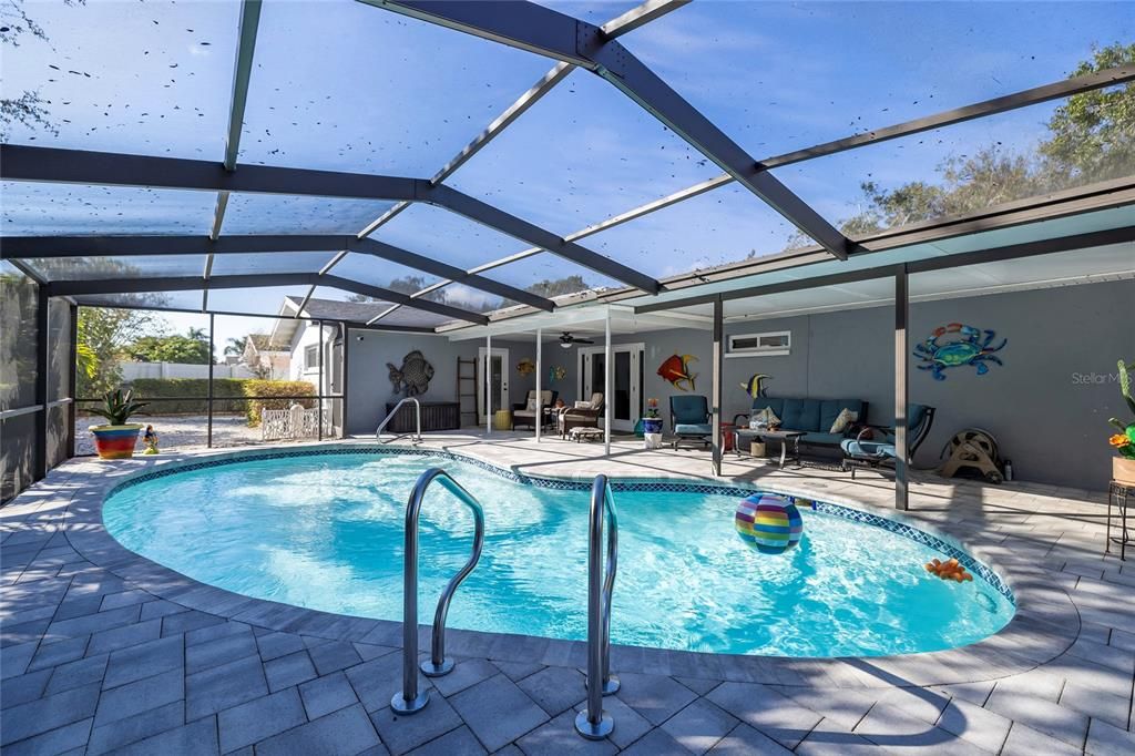 Large, screened pool and patio