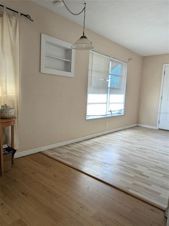 living or family room off kitchen, door to screened porch