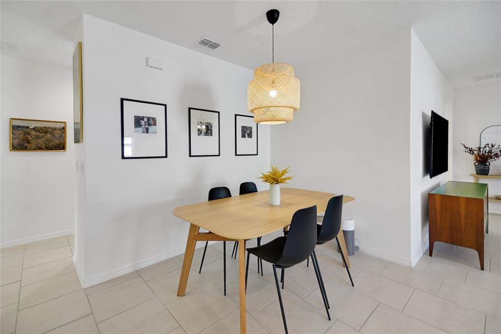 Dining room with glimpse into living room