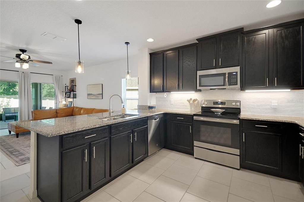 Double stainless sinks - open to living room so the chef is always a part of the party!