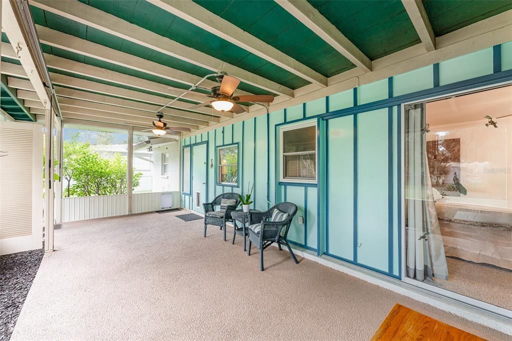 Adorable large screened back porch.