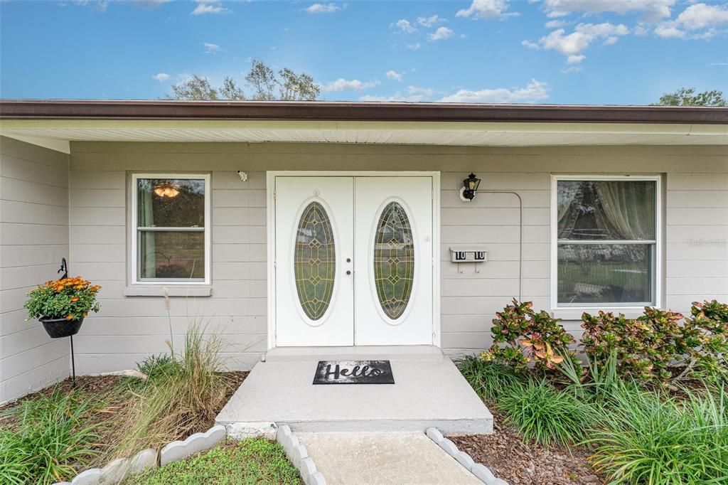 Double entry door and private mailbox.