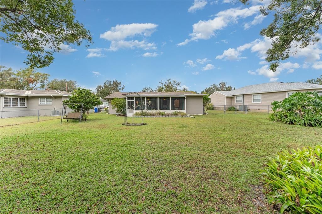 Large fenced back yard.