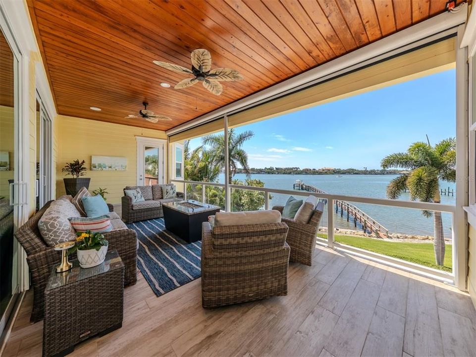 Upstairs patio with roll down screens