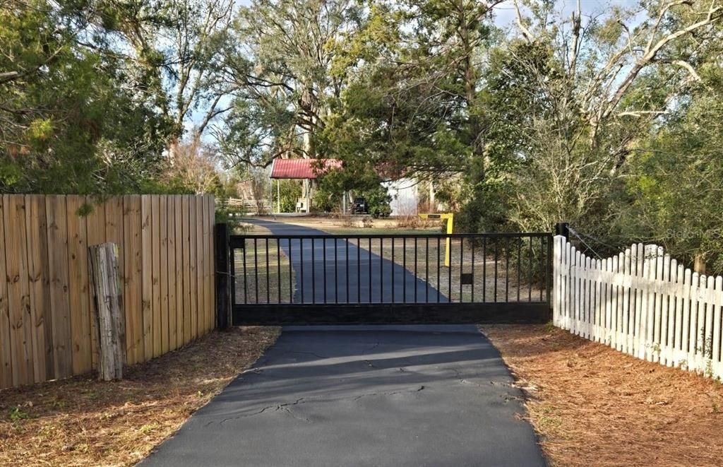 Front Gate entrance newly sealed driveway