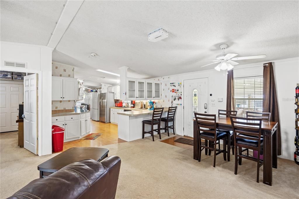 Open plan to kitchen and dining.  Light and bright!