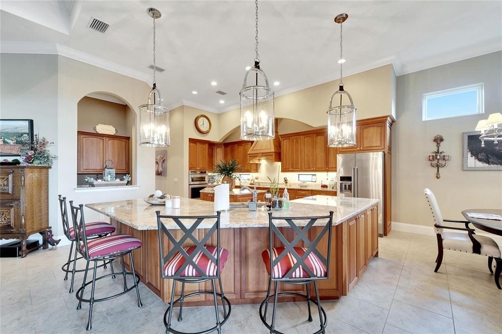 Chef's Kitchen with granite countertops and separate eat in kitchen area