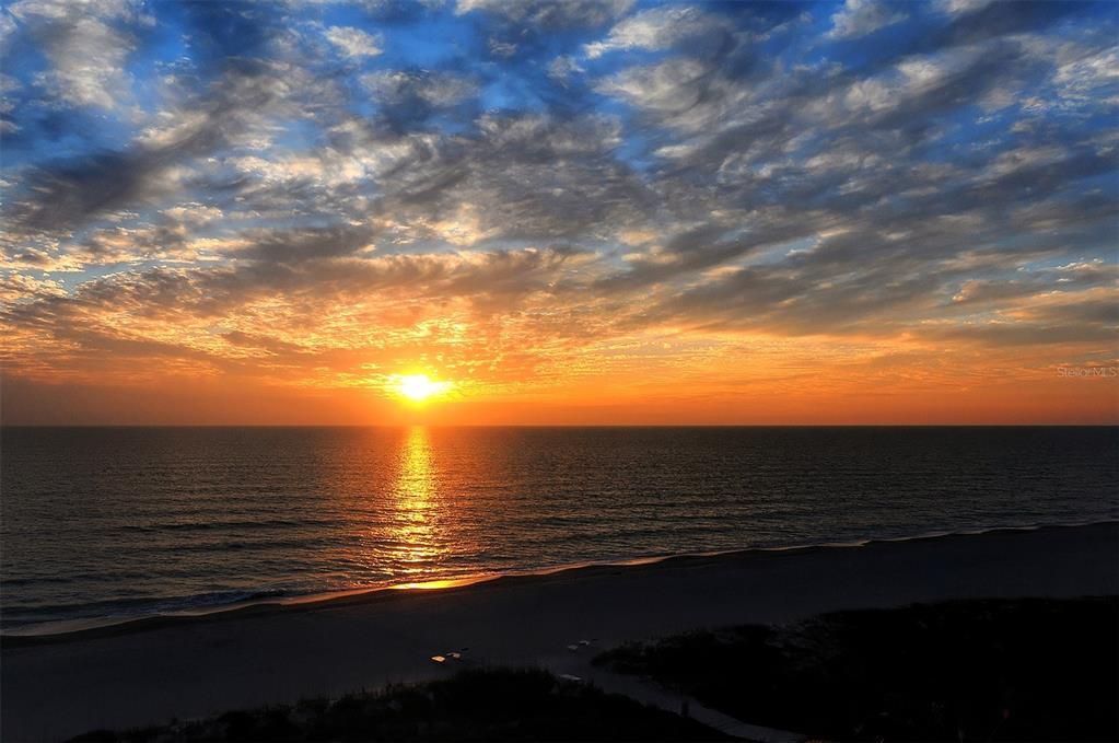 Sunset on the Whispering Sands beach.